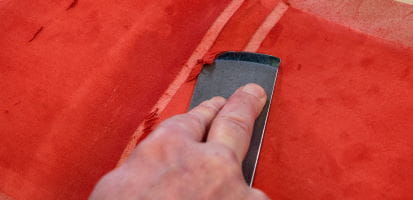 Image showing leather paring knife in action